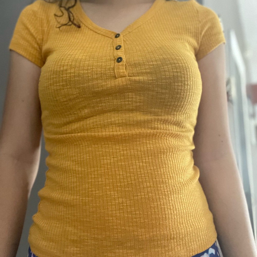 Yellow v neck shirt